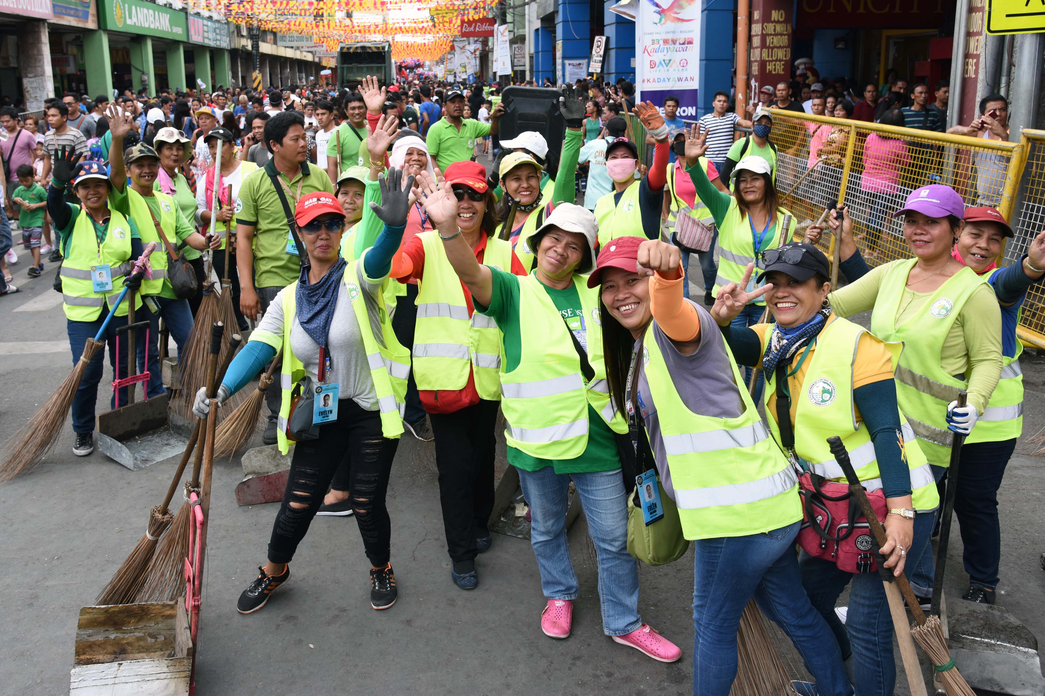 Sweepers working during a community event